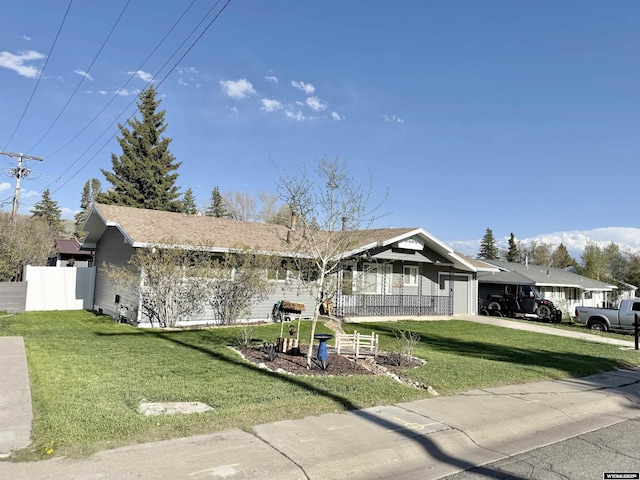 921 3RD W Ave, Kemmerer, WY 83101 - ranch-style home with a garage