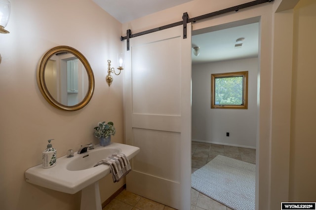 370 Aster, Casper, WY 82604 - bathroom with tile patterned flooring and baseboards