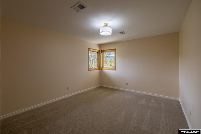 370 Aster, Casper, WY 82604 - carpeted spare room with baseboards