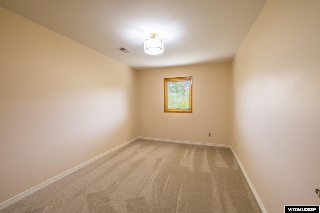 370 Aster, Casper, WY 82604 - unfurnished room with light colored carpet and baseboards
