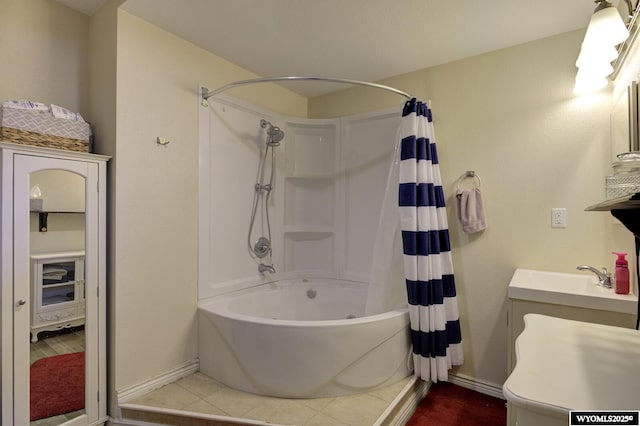 363 Oleander St, Casper, WY 82604 - bathroom with shower / tub combo with curtain, a sink, and baseboards