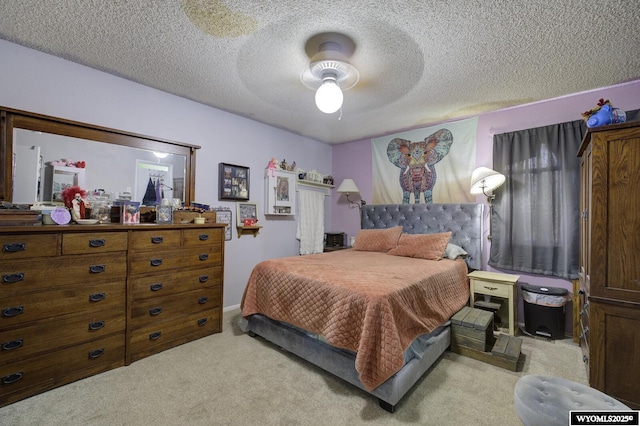 363 Oleander St, Casper, WY 82604 - carpeted bedroom featuring a textured ceiling and ceiling fan