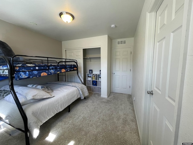 344 Via Assisi Dr, Rock Springs, WY 82901 - carpeted bedroom featuring a closet and baseboards