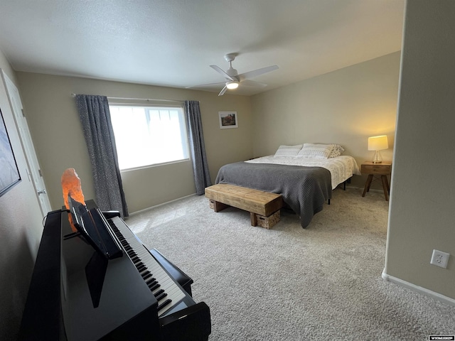 344 Via Assisi Dr, Rock Springs, WY 82901 - bedroom featuring carpet, baseboards, a ceiling fan, and a desk
