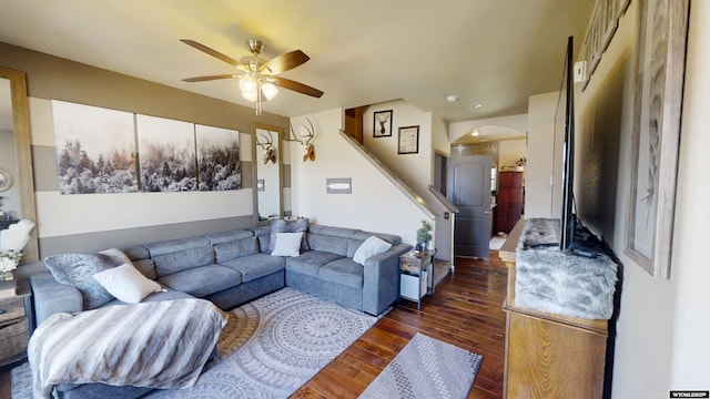810 S 3rd Ave, Mills, WY 82604 - living room with ceiling fan, dark wood-type flooring, arched walkways, and stairs