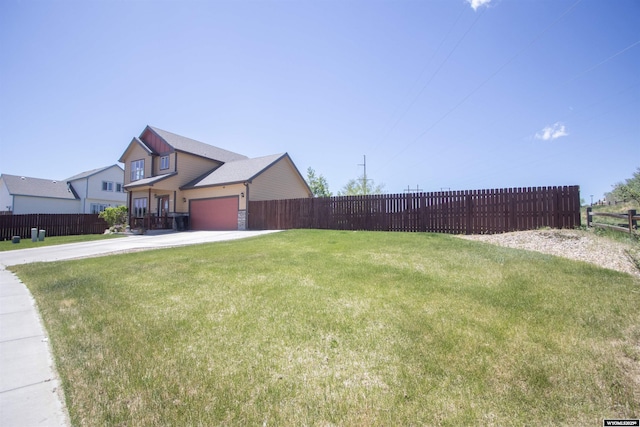 810 S 3rd Ave, Mills, WY 82604 - view of yard with driveway and an attached garage