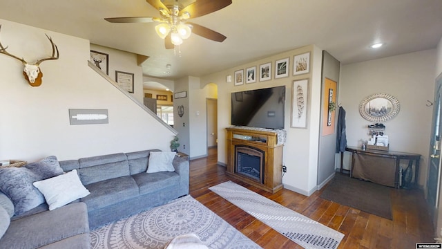 810 S 3rd Ave, Mills, WY 82604 - living room with a fireplace, hardwood / wood-style floors, ceiling fan, arched walkways, and recessed lighting