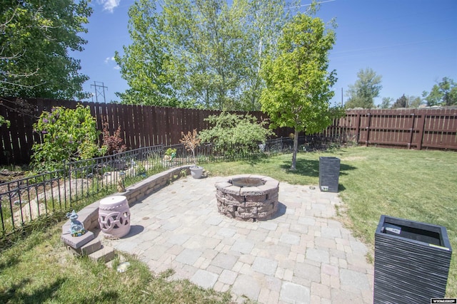 810 S 3rd Ave, Mills, WY 82604 - view of patio with a fire pit