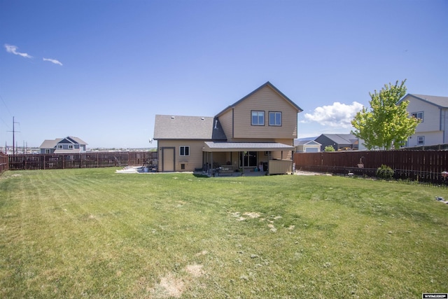 810 S 3rd Ave, Mills, WY 82604 - back of property with a patio area