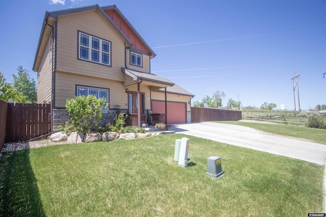 810 S 3rd Ave, Mills, WY 82604 - view of front facade with driveway, an attached garage, and stone siding