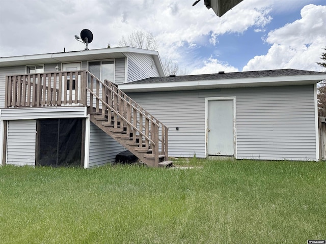 1130 Canyon Rd, Kemmerer, WY 83101 - rear view of house with a yard, stairway, and a wooden deck