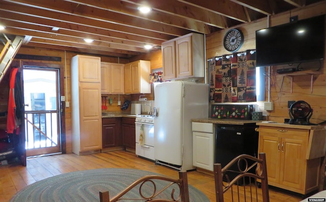 1725 E End Rd, Casper, WY 82601 - kitchen with white appliances, light wood-style flooring, light countertops, and wooden walls
