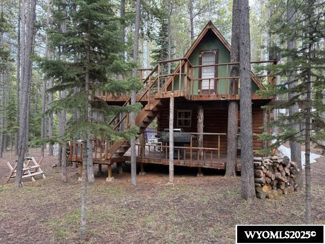 1725 E End Rd, Casper, WY 82601 - back of property with a wooden deck