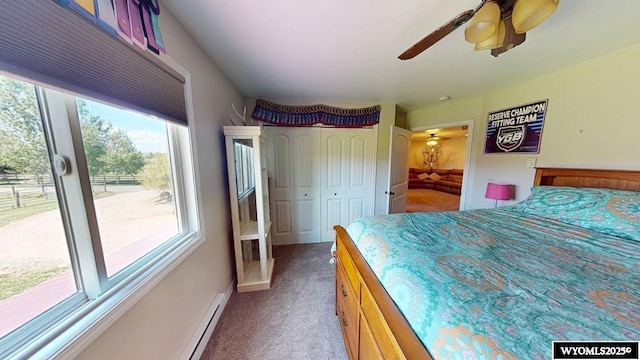 200 Irwin Ln, Lander, WY 82520 - carpeted bedroom with ceiling fan, ensuite bathroom, and baseboards