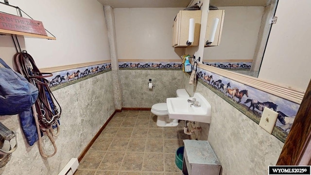 200 Irwin Ln, Lander, WY 82520 - bathroom with a sink, wainscoting, and toilet