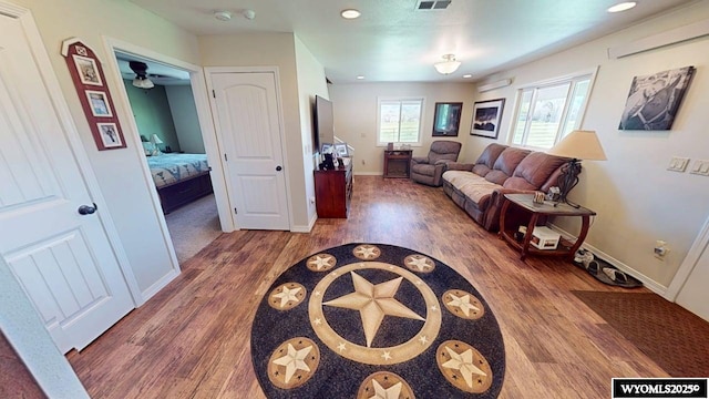 200 Irwin Ln, Lander, WY 82520 - living area featuring wood finished floors, baseboards, a ceiling fan, and recessed lighting