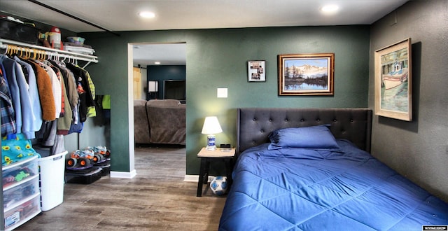 6653 Natrona Rd, Natrona, WY 82646 - bedroom featuring wood finished floors, recessed lighting, and baseboards