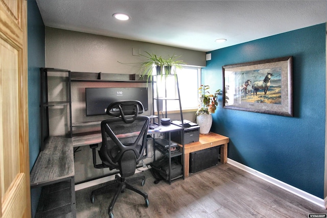 6653 Natrona Rd, Natrona, WY 82646 - office area featuring wood finished floors, baseboards, recessed lighting, and a textured ceiling