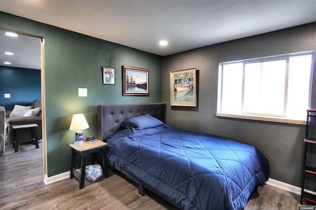 6653 Natrona Rd, Natrona, WY 82646 - bedroom featuring wood finished floors, baseboards, and recessed lighting