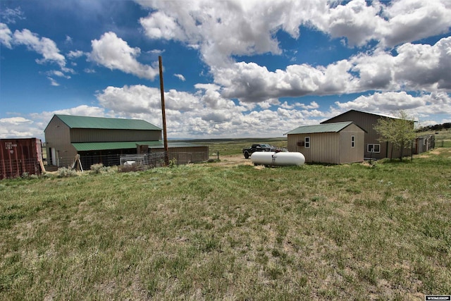 6653 Natrona Rd, Natrona, WY 82646 - view of yard with an outdoor structure and an outbuilding