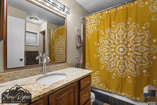 1131 W 60th St, Casper, WY 82601 - full bathroom featuring vanity and a shower with shower curtain