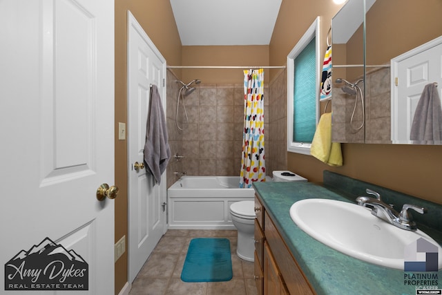1131 W 60th St, Casper, WY 82601 - bathroom with toilet, vanity, shower / tub combo with curtain, and tile patterned floors