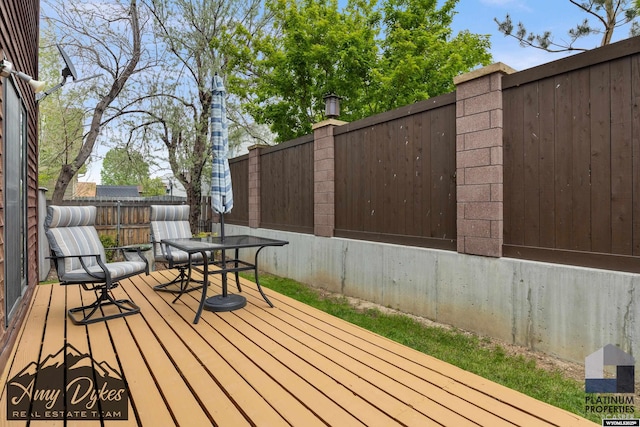 1131 W 60th St, Casper, WY 82601 - deck featuring outdoor dining space
