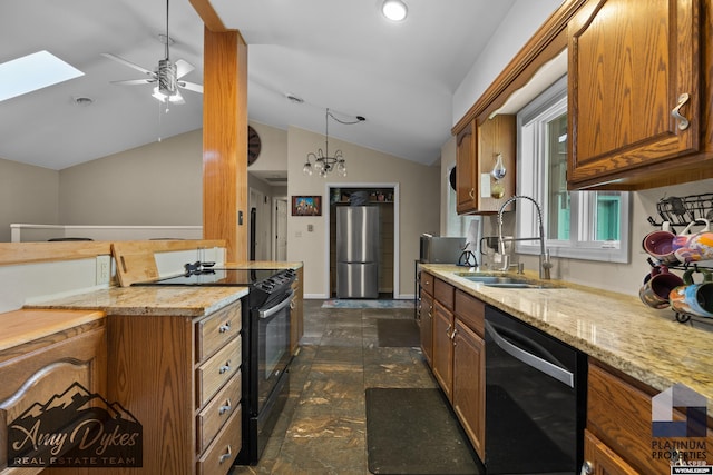 1131 W 60th St, Casper, WY 82601 - kitchen with dishwasher, black / electric stove, a sink, freestanding refrigerator, and vaulted ceiling