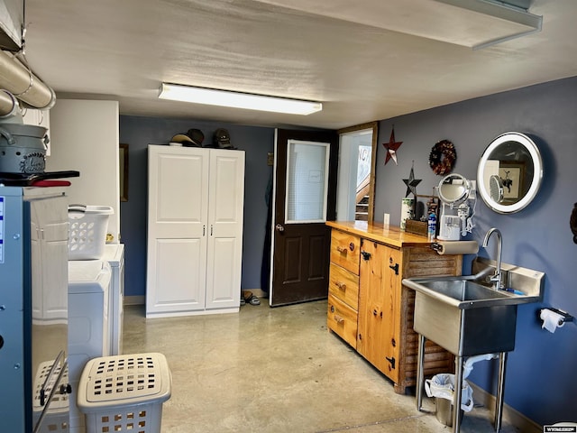 2609 Beaver Creek Rd, Shell, WY 82441 - basement with washing machine and clothes dryer and a sink