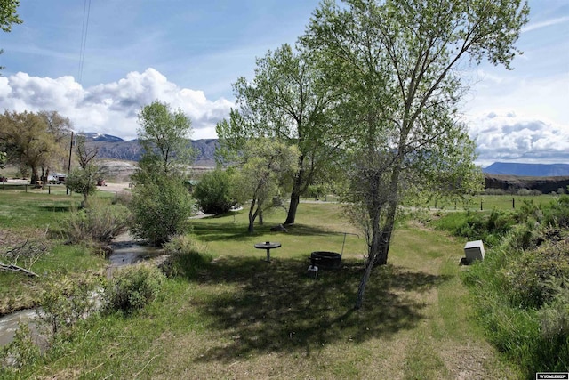 2609 Beaver Creek Rd, Shell, WY 82441 - view of home's community with a mountain view and a lawn