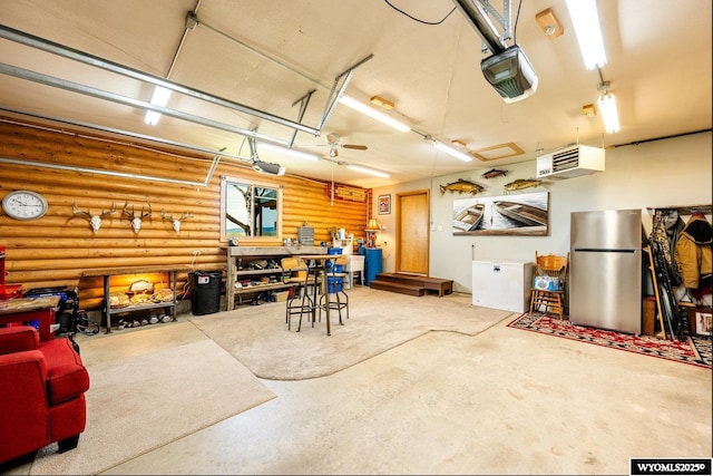 49 Cheyenne Rd, Banner, WY 82832 - garage featuring freestanding refrigerator, a garage door opener, and a heating unit