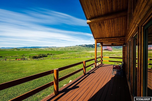 49 Cheyenne Rd, Banner, WY 82832 - wooden terrace featuring a view of rural / pastoral area, a yard, and a mountain view