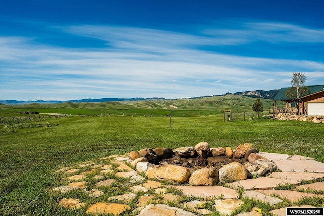 49 Cheyenne Rd, Banner, WY 82832 - view of grassy yard with a view of countryside and a mountain view
