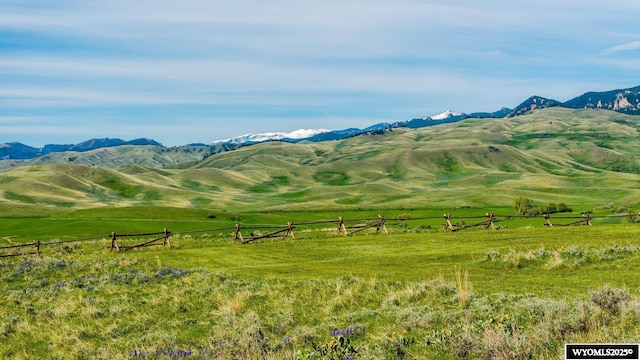 49 Cheyenne Rd, Banner, WY 82832 - view of mountain background featuring rural landscape and a pastoral area