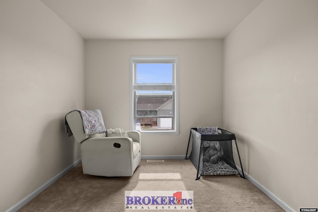 2511 Mercy Ln, Casper, WY 82609 - sitting room featuring light carpet and baseboards