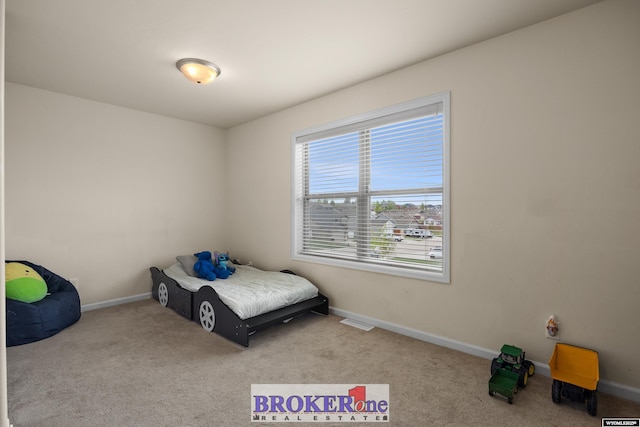 2511 Mercy Ln, Casper, WY 82609 - carpeted bedroom with baseboards