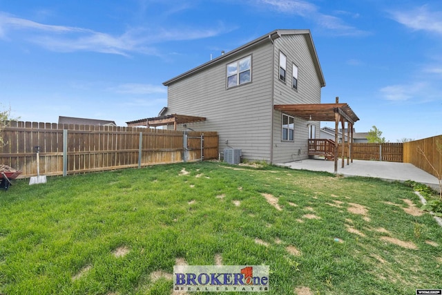 2511 Mercy Ln, Casper, WY 82609 - rear view of house with a patio area and central air condition unit