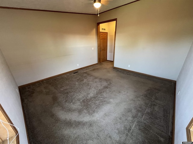 1426 Pinecrest, Riverton, WY 82501 - spare room featuring a ceiling fan, baseboards, crown molding, and carpet flooring