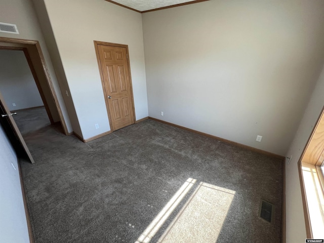 1426 Pinecrest, Riverton, WY 82501 - unfurnished bedroom featuring carpet floors, baseboards, and ornamental molding