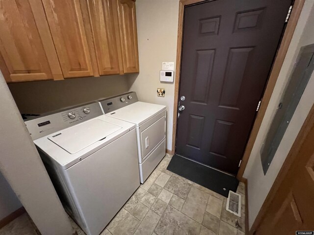 1426 Pinecrest, Riverton, WY 82501 - laundry area featuring washer and dryer, cabinet space, and baseboards