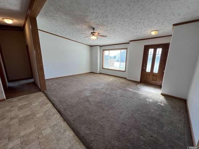 1426 Pinecrest, Riverton, WY 82501 - unfurnished living room with ornamental molding, ceiling fan, carpet, baseboards, and a textured ceiling