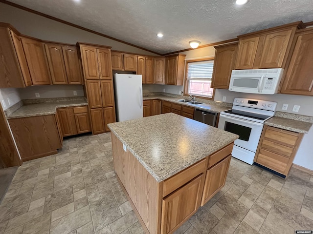 1426 Pinecrest, Riverton, WY 82501 - kitchen featuring white appliances, lofted ceiling, a textured ceiling, brown cabinetry, and crown molding