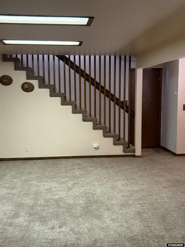 221 Rimrock Dr, Evanston, WY 82930 - stairway featuring carpet flooring and baseboards