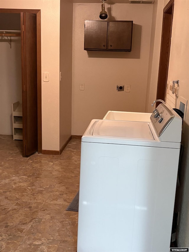 221 Rimrock Dr, Evanston, WY 82930 - laundry room with washer / dryer and baseboards