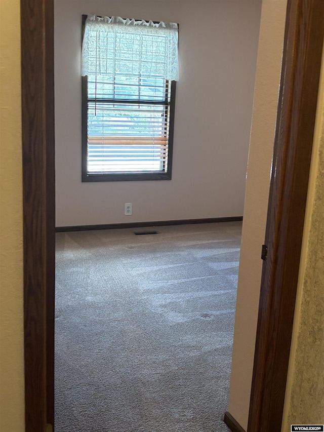 221 Rimrock Dr, Evanston, WY 82930 - unfurnished room with carpet flooring and baseboards
