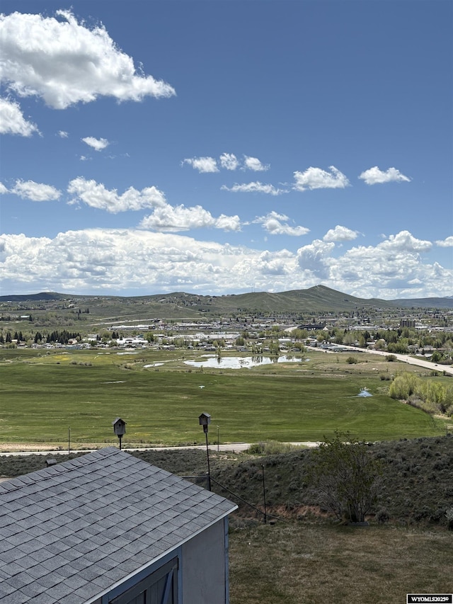 221 Rimrock Dr, Evanston, WY 82930 - view of mountain backdrop featuring a nearby body of water