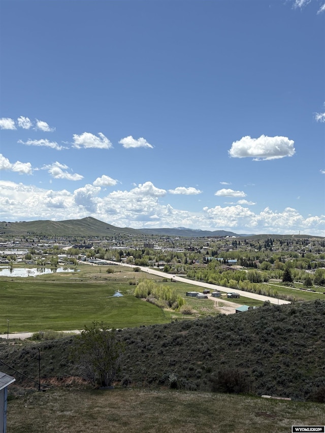 221 Rimrock Dr, Evanston, WY 82930 - view of mountain background featuring a large body of water and a golf course