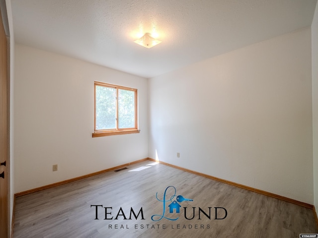 1235 S Durbin St, Casper, WY 82601 - spare room featuring light wood finished floors and baseboards