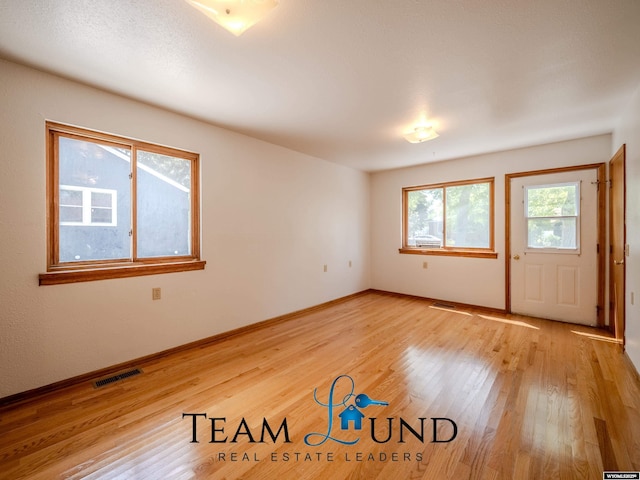 1235 S Durbin St, Casper, WY 82601 - unfurnished room featuring light wood finished floors and baseboards