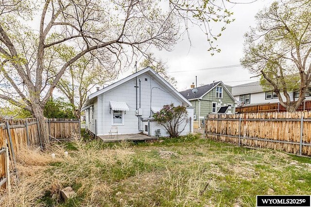804 Connecticut Ave, Rock Springs, WY 82901 - back of property with a fenced backyard and a deck